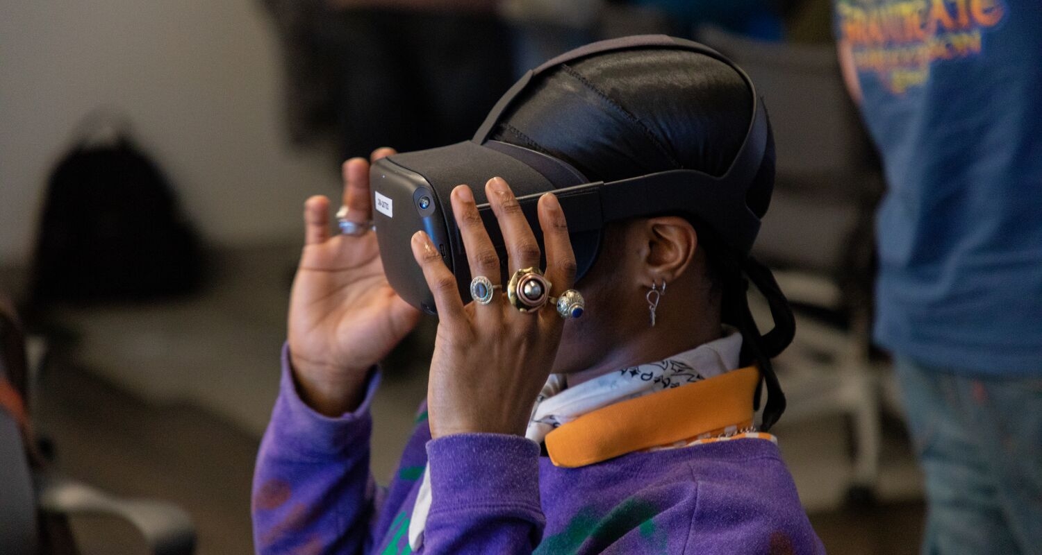 UArts game art student uses a VR headset in classroom