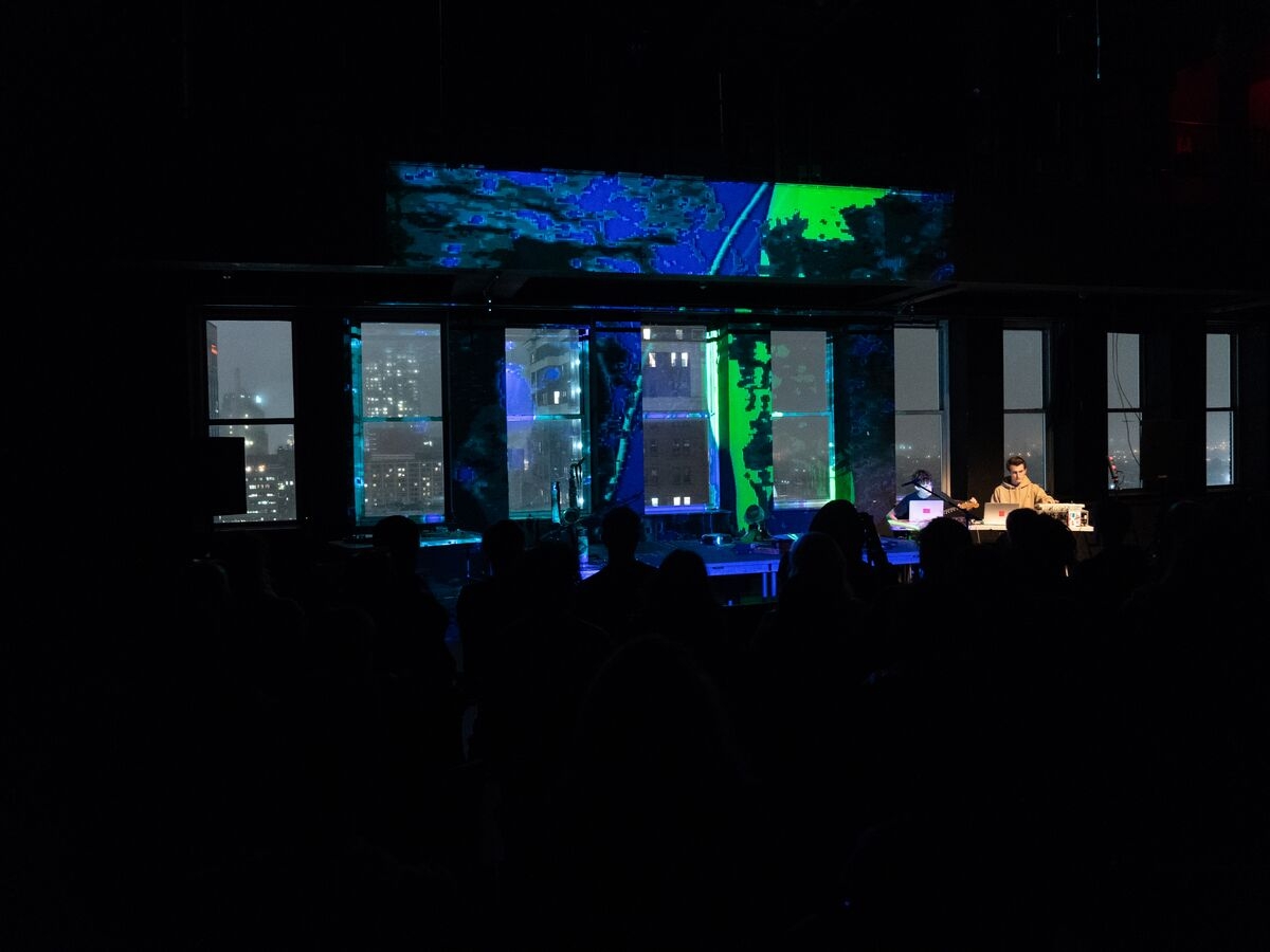 Students perform with visuals during the Out of the Box concert.