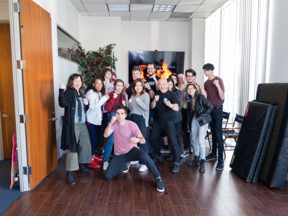 Students and faculty pose for a picture with professional stuntmen during their visit to the Stuntmen's Association of Motion Pictures | Stuntwomen's Association of Motion Pictures.