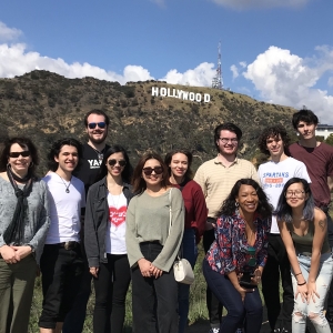 Students and faculty pose for a picture in front of the Hollywood sign during their trip to Los Angeles, CA.