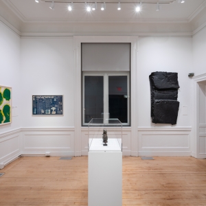 Invisible City exhibition, Gallery A; three works on the wall and one in a case in the center of the room