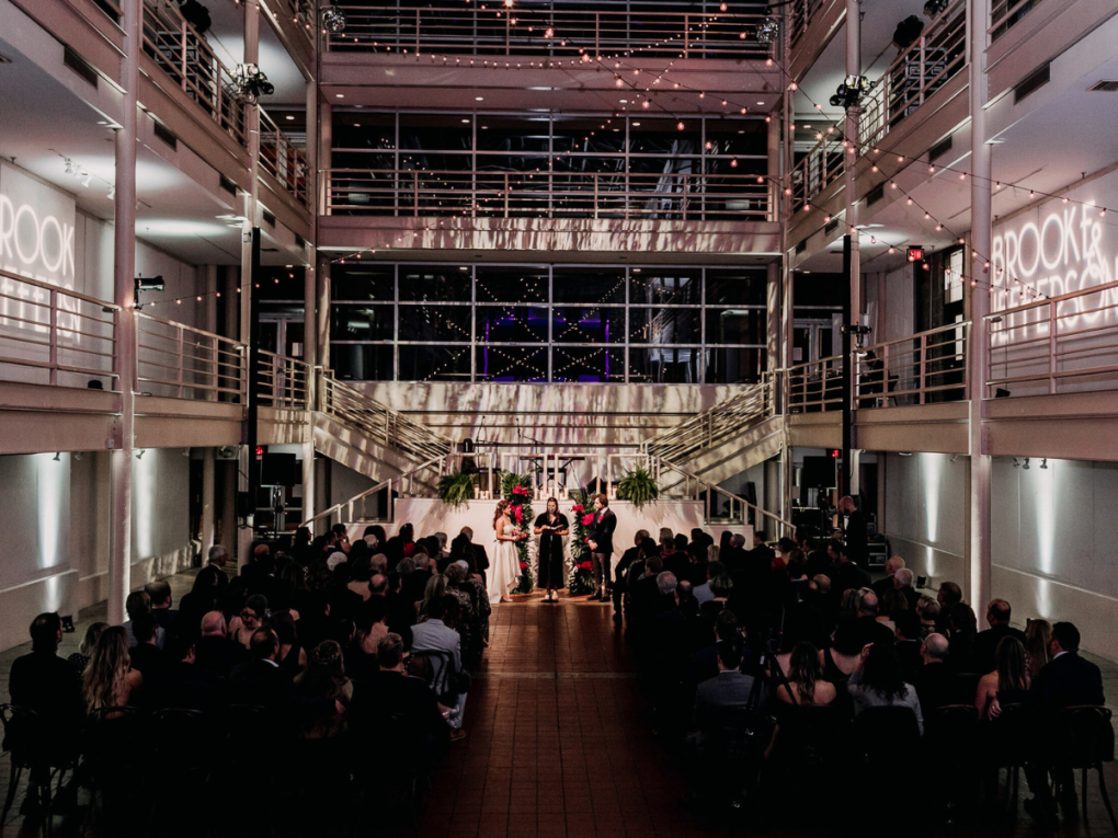 wedding ceremony being held in Solmssen Court