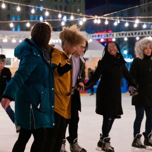 Students ice skate in Dilworth Park